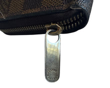Louis Vuitton zippy wallet in Damier Ebene leather