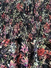 Aqua women’s floral smocked mini skirt XL