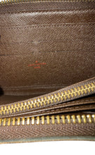 Louis Vuitton zippy wallet in Damier Ebene leather