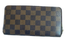 Louis Vuitton zippy wallet in Damier Ebene leather