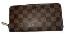 Louis Vuitton zippy wallet in Damier Ebene leather